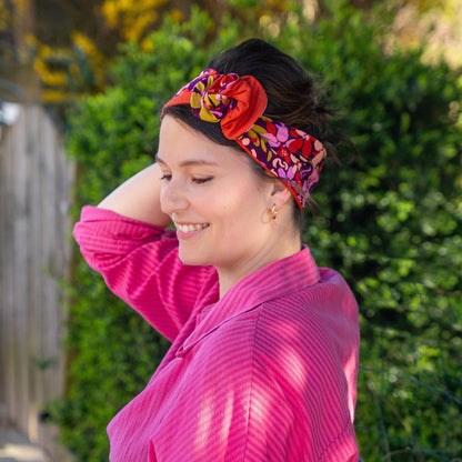 bandeau cheveux femme à motifs fleuris violet et rouille