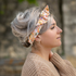 bandeau cheveux fin à pointes et motifs fleuris orange et blancs